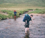 Dave crossing the river
