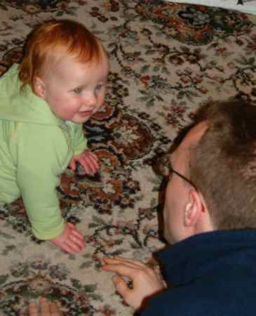 20031214-164734.jpg - Father and daughter crawling