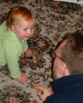 Father and daughter crawling
