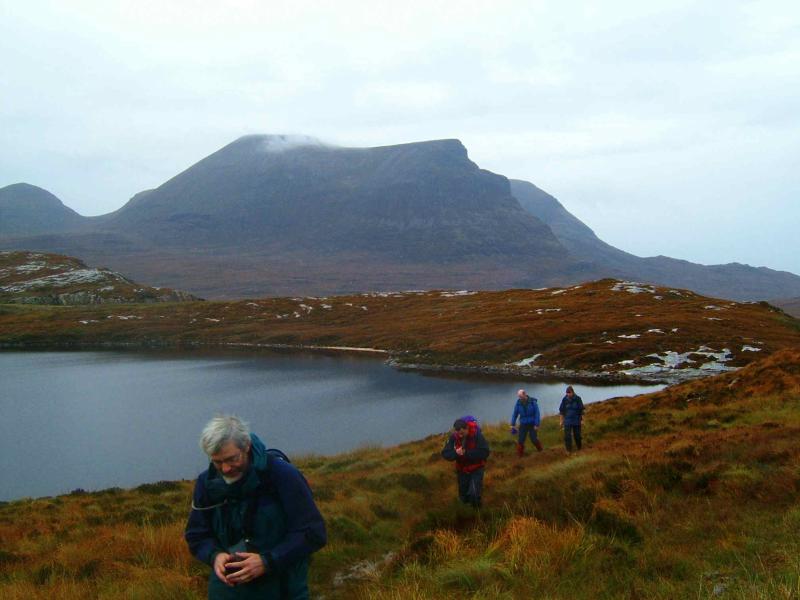 20041017-124158.jpg - John, Paul, Ian and Alison ascending by Loch na Gainmhich (Cuinneag behind)