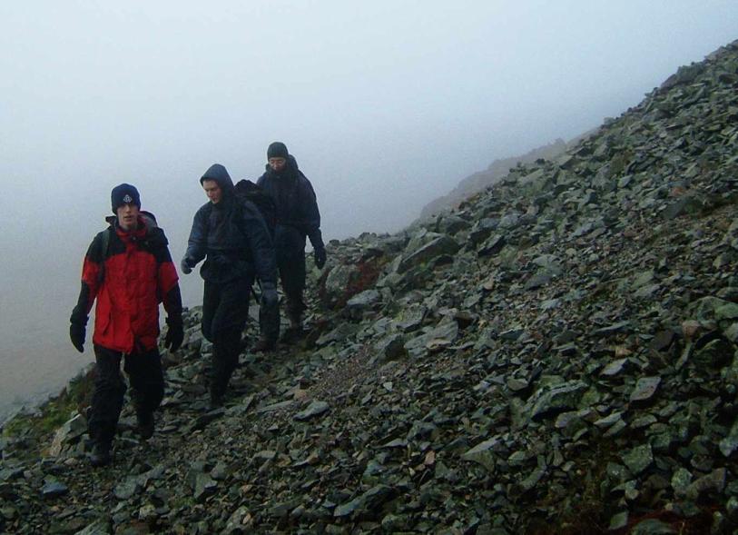 20050110-120642.jpg - Tom, Jack and David traverse the screes below Pikes Crag