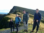 Will, Helen, Michael and David pose before Craig Cwm Amarch