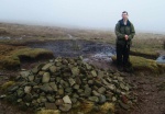 Mark on the border - England lies beyond, swathed in mist