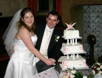 Sarah and Paul cut the cake