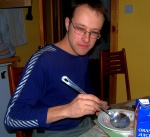 Tim eats breakfast using the Enormous Spoon