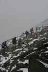 The final ascent in mist and snow