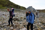 Walking along the pebble beach in front of the school