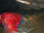 Another caver emerges