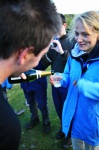 Katie gets the first glass of fizz