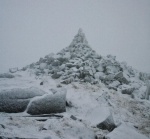 Summit cairn in the mist