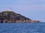 Passing the lighthouse at the northern end of Rona